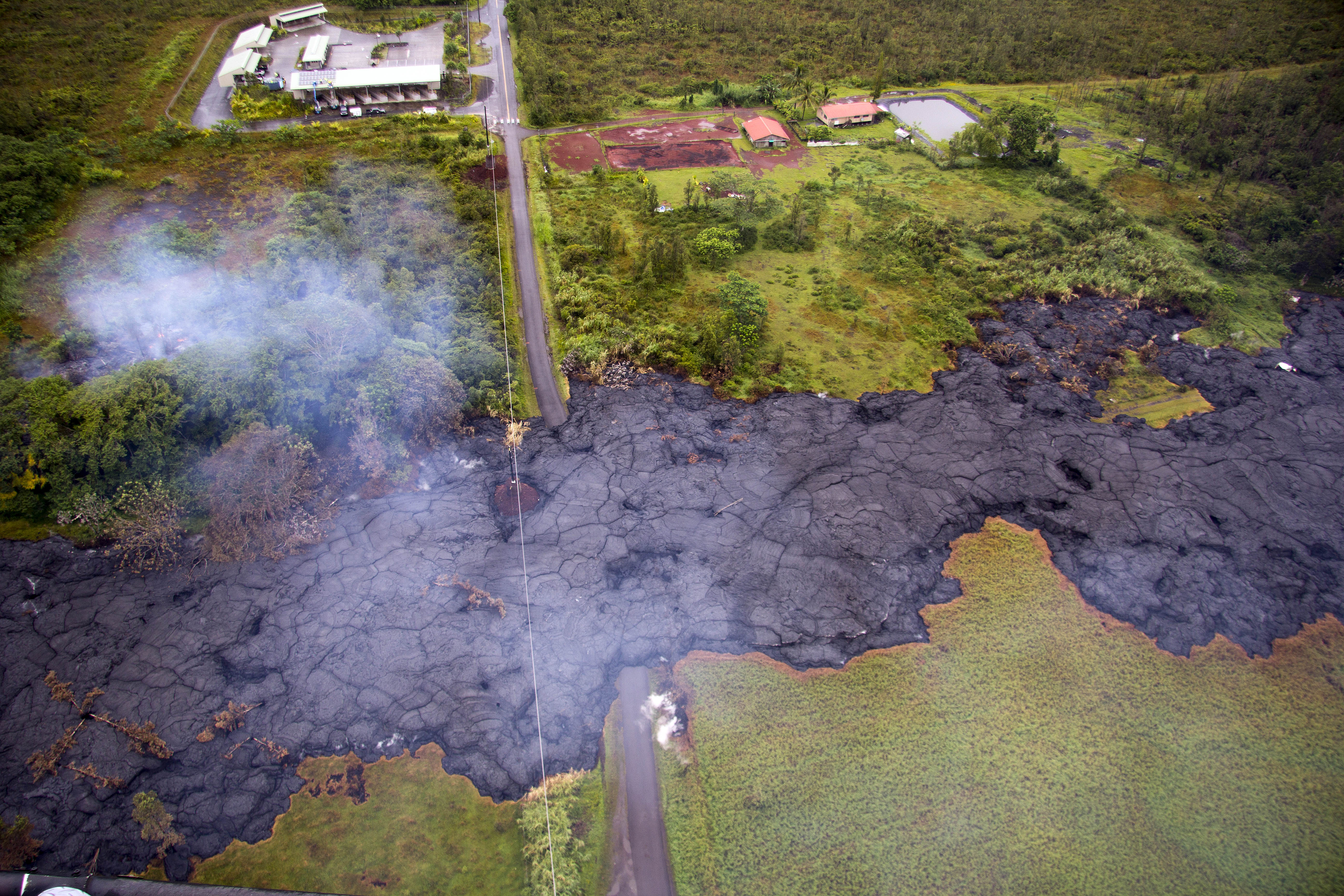 Newsela | Hot melted rock called lava is seeping toward the sea in a Hawaiian town